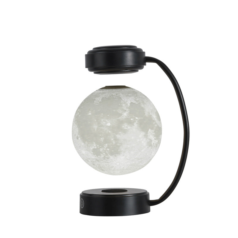 Levitating 3D moon lamp floating above its wooden base