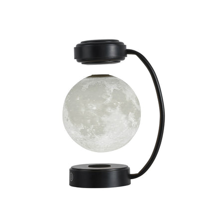 Levitating 3D moon lamp floating above its wooden base