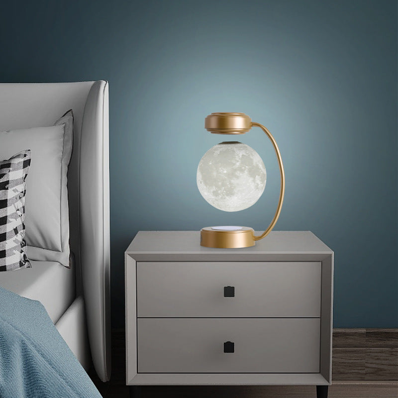 Levitating moon lamp shown in a room setting